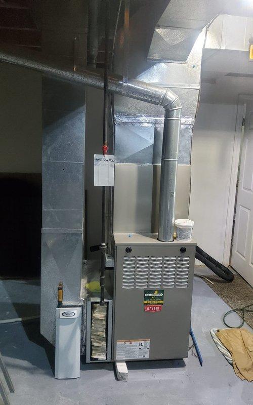 Completed routine AC tune-up and preventative maintenance on residential cooling system. Performed comprehensive inspection of outdoor condenser unit, including cleaning of debris from exterior grille, verification of proper refrigerant levels, and assessment of electrical connections. Inspected indoor Bryant furnace and evaporator coil assembly, replaced air filter, and verified proper airflow through ductwork system to ensure optimal system performance for the cooling season.