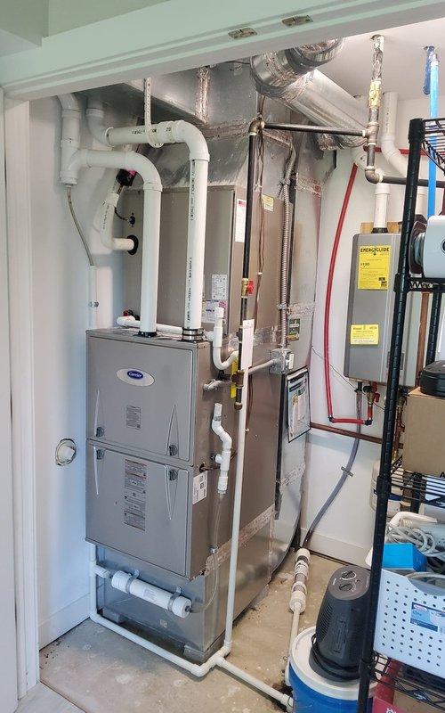 Completed MVP maintenance on 5-year-old Carrier split system. Performed comprehensive inspection of indoor air handler unit and outdoor condenser, verified all electrical connections, checked refrigerant levels, cleaned condenser coils, inspected ductwork and PVC condensate drain lines for proper operation, and confirmed system is operating within manufacturer specifications.
