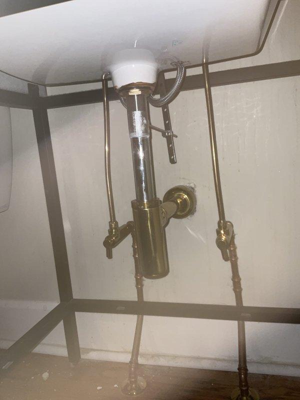 Removed and reset toilet after replacing defective PVC tee and toilet bend in the drainage system. Installed a 4-inch Gripper expanding plug in an existing floor drain. Rerouted approximately 20 feet of condensate drainage line from the basement furnace to a properly trapped floor drain, ensuring compliance with plumbing codes and proper system function.