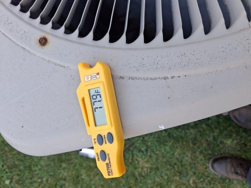 Performed routine air conditioning tune-up on residential cooling system. Conducted comprehensive inspection of outdoor condensing unit, verified proper fan operation, and measured system temperatures using diagnostic equipment, confirming unit is operating within normal parameters. No deficiencies identified; system functioning properly at time of service.