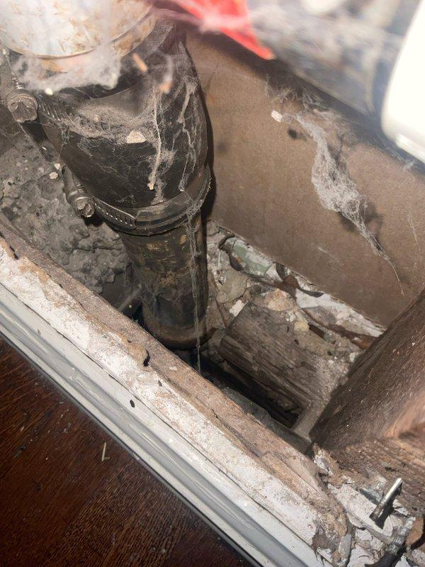 Completed drain line repair for sink by exposing and accessing concealed plumbing within ceiling cavity. Opened ceiling to locate and assess deteriorated drain pipe, removed damaged section, and installed new drain line with proper fittings and secure connections. Restored proper drainage function and ensured all connections were leak-free and code-compliant.