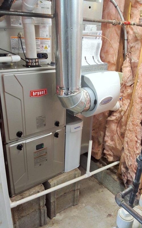 Completed full HVAC system replacement including installation of Bryant 97% high efficiency modulating gas furnace with variable speed blower motor and new indoor evaporator coil. Installed Bryant multi-stage air conditioning system with outdoor condenser unit, new condenser pad, and electrical disconnect box providing five stages of cooling for enhanced dehumidification. Integrated Bryant smart communicating thermostat for system control and optimization. Added Aprilaire high efficiency air cleaner with premium filtration and Aprilaire bypass humidifier for improved indoor air quality. Configured all ductwork connections, established proper airflow, and performed system commissioning with differential pressure testing to verify optimal performance across all heating and cooling stages.