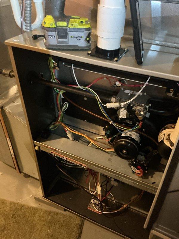 Completed comprehensive tune-up on 11-year-old American Standard air conditioning system. Performed full inspection of outdoor condensing unit and indoor air handler, checked all electrical connections and wiring, tested capacitors and contactors, verified refrigerant pressures, cleaned condenser coils, inspected blower motor assembly, and confirmed proper drainage through condensate system. All components found operating within manufacturer specifications. Provided quote for smart thermostat upgrade as requested.