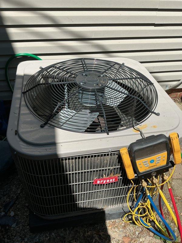Responded to no cooling call on 6-year-old Bryant air conditioning system. Upon arrival, performed diagnostic evaluation of outdoor condensing unit using digital manifold gauge set to measure system pressures and temperatures. Inspected refrigerant lines, electrical connections, and compressor operation. Verified proper voltage supply and tested capacitor functionality. Checked refrigerant charge levels and examined all service ports for leaks or abnormalities. System evaluated and necessary repairs identified to restore cooling operation.