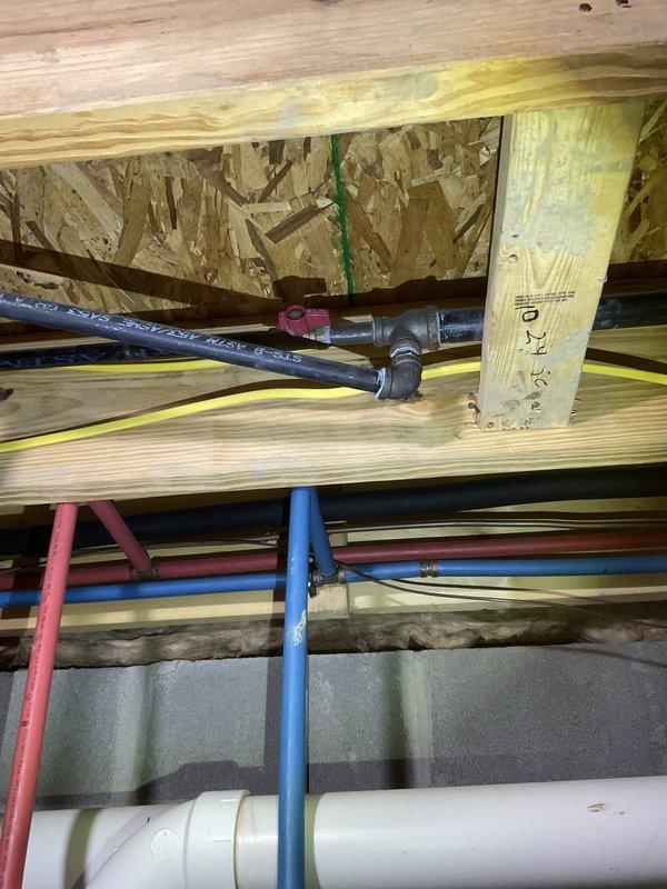 Provided estimate for whole house water filtration system installation at property where furnace installation was concurrently being performed. Assessed existing plumbing infrastructure including PEX water lines, shut-off valves, and water heater location to determine optimal filtration system placement and integration points. Documented current plumbing configuration with photos to support comprehensive estimate for filtration equipment and installation labor.