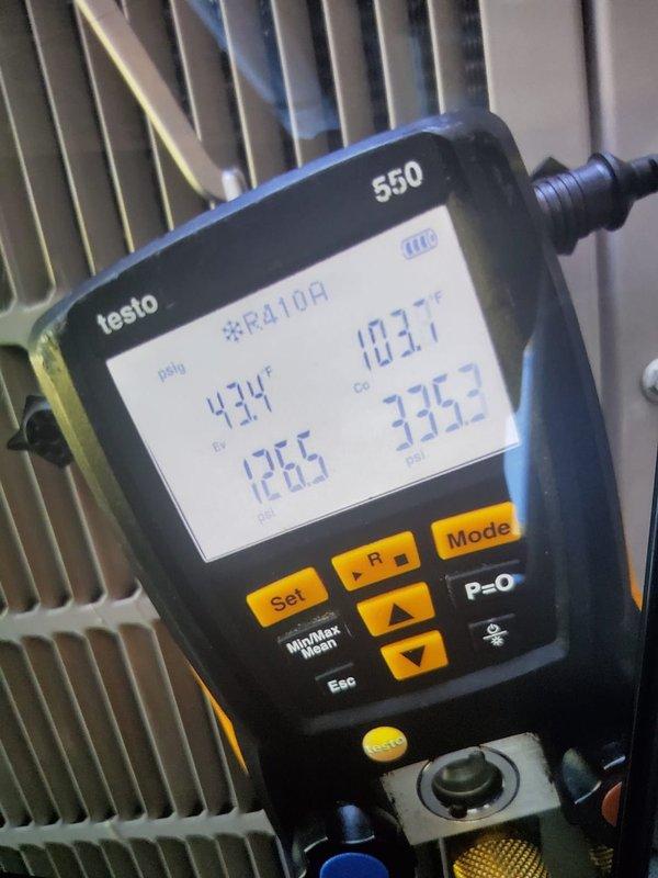 Found the system low on refrigerant and added UV dye along with refrigerant to bring the system back to proper charge. A follow-up visit is scheduled in 1-1.5 weeks to locate the leak using the UV dye under black light inspection.
