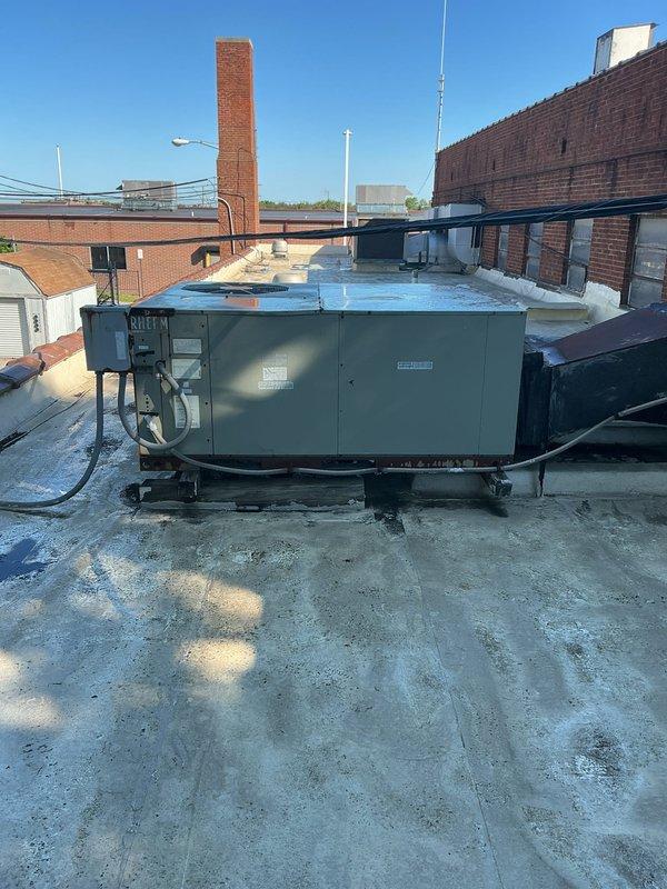 Conducted comprehensive site assessment and provided replacement estimate for commercial rooftop package unit cooling system. Evaluated existing equipment access requirements, documented current HVAC unit condition with photographs, and confirmed specifications for new installation including duct smoke detector integration and programmable thermostat compatibility.