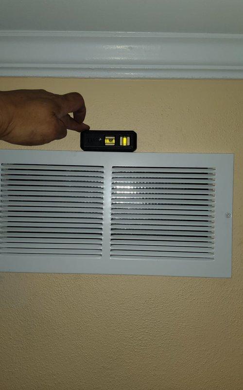Installed 6 feet of flexible return ductwork to provide proper air circulation to a basement room. Cut in and mounted a new return air grille on the wall to complete the return air pathway. Verified proper airflow and system operation upon completion.