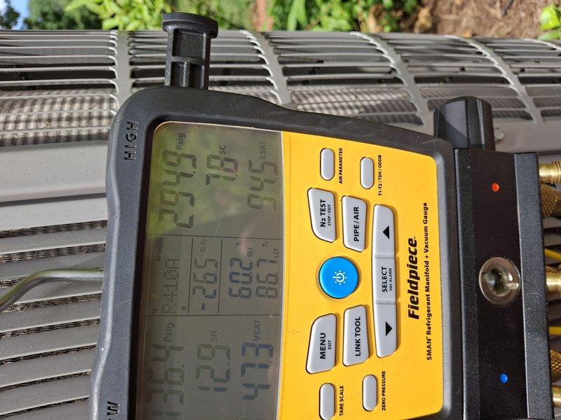 Completed comprehensive cooling tune-up service on two HVAC systems. Performed detailed inspection of evaporator coils, which showed normal condensation buildup indicating proper cooling operation. Utilized Fieldpiece digital manifold gauges to measure and verify refrigerant pressures, superheat, and subcool levels on both outdoor condensing units. All system parameters were found to be within manufacturer specifications, confirming optimal performance and efficiency of both cooling systems.