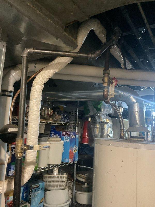 Completed gas line rerouting in basement utility area to accommodate updated mechanical system configuration. Work involved relocating existing gas piping away from water heater and HVAC components, installing new copper gas lines with proper fittings and connections, and ensuring all installations met code requirements for clearances and safety. All connections were pressure tested and verified for proper operation.