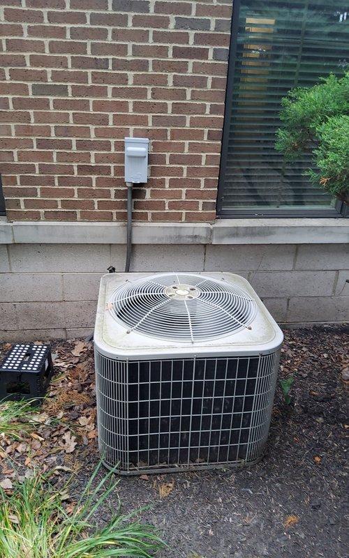 Completed preventive maintenance cooling tune-up on residential air conditioning system. Performed comprehensive inspection of outdoor condenser unit, verified proper operation of compressor and condenser fan motor, checked refrigerant levels, cleaned condenser coils, and inspected electrical connections and disconnect box. Unit found to be operating within normal parameters with no immediate service needs identified.
