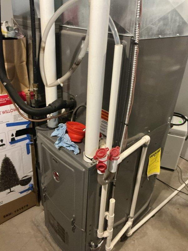 Responded to service call for HVAC unit leaking water with consistent drip from pipe. Upon inspection, identified condensate drainage issue from the air handler system. Cleared condensate line blockage, verified proper drainage flow, and tested system operation to confirm leak was resolved.