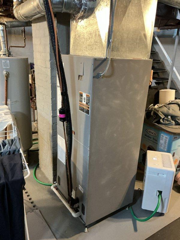 Responded to service call for 9-year-old central air conditioning system experiencing temperature imbalance issues, with downstairs area becoming excessively cold while upstairs struggled to maintain temperatures below 75°F. Performed comprehensive system evaluation of the air handler unit located in basement mechanical room and inspected exterior ventilation components on deck area. Assessed airflow distribution, damper positions, and ductwork configuration to identify cause of thermal stratification between floors. Adjusted zone dampers and balanced airflow delivery to resolve temperature differential issues, ensuring proper conditioned air distribution throughout both levels of the residence for optimal comfort and system efficiency.