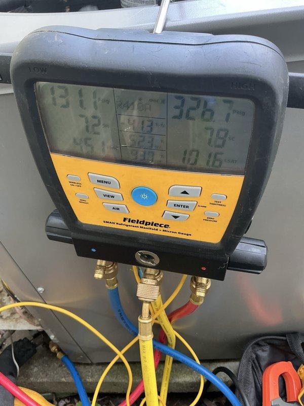 # HVAC Maintenance - Cooling System

Performed comprehensive preventative maintenance tune-up on a 12-year-old residential air conditioning system with no reported issues or concerns. Upon arrival, the system was operating properly with no active symptoms.

## Work Performed

Conducted complete system diagnostics using digital manifold gauges to measure refrigerant pressures and temperatures across the system. Recorded suction and discharge pressures, verifying proper refrigerant charge levels and system performance. Monitored superheat and subcooling values to ensure optimal heat transfer and system efficiency.

Inspected outdoor condensing unit components including compressor operation, condenser coil condition, and refrigerant line connections. Verified proper operation of service valves and access ports. Checked electrical connections and contactors for signs of wear or deterioration.

Evaluated system airflow and temperature differential to confirm adequate cooling capacity. All m