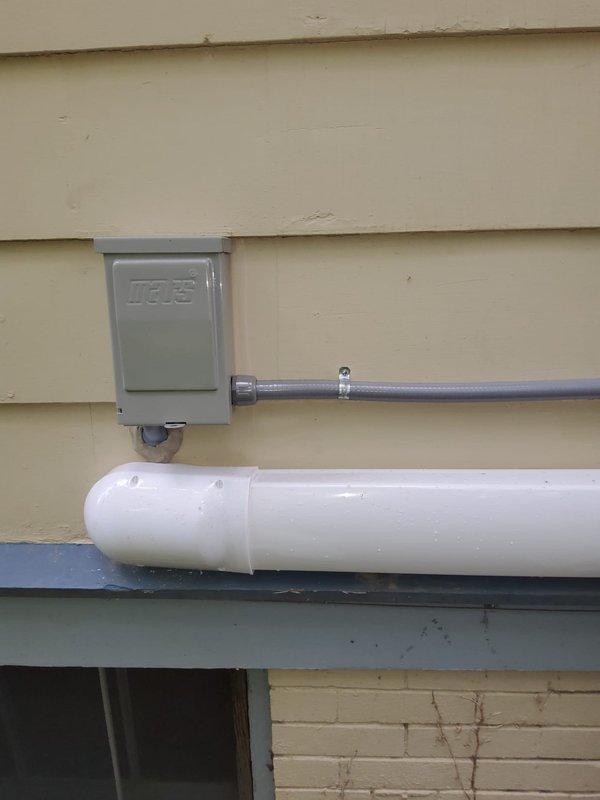 Successfully installed a complete 5-zone Bryant ductless mini split heat pump system throughout the residence. Mounted two high wall indoor units in the front bedrooms on the second floor to provide cooling coverage for the entire level when doors remain open. Installed two additional high wall mounted units in the kitchen and living room areas on the main floor. Placed a floor console style indoor unit in the third floor bedroom to accommodate the space requirements. Positioned the outdoor condenser unit at the rear of the home and ran refrigerant lines, electrical conduit, and condensate drainage through the exterior wall. All electrical connections were secured in appropriate junction boxes with proper conduit routing along the building exterior. System was tested, charged, and verified operational across all zones with proper airflow and temperature control functionality.