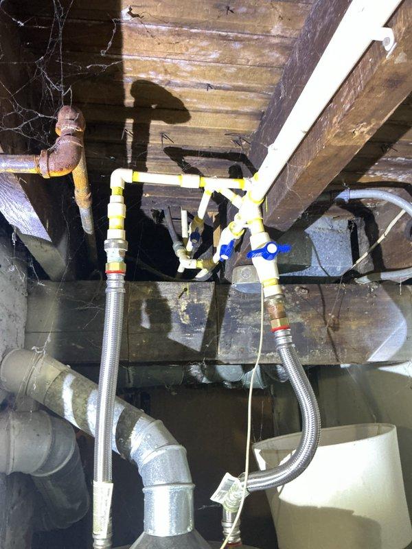 Conducted on-site assessment and provided estimate for water heater replacement in residential utility area. Evaluated existing GE tank-style water heater installation, including copper supply line connections, shut-off valves, and electrical service requirements. Discussed both conventional tank and tankless water heater options with customer based on household needs and existing infrastructure. Documented current installation configuration, including supply and discharge piping, gas connections with PVC venting system, and proximity to electrical panel. Photographed existing equipment and surrounding plumbing infrastructure to prepare comprehensive replacement proposal covering both equipment options.