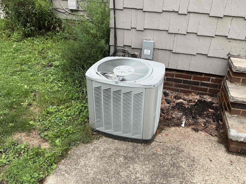 Performed comprehensive evaluation of 21-year-old residential HVAC system to assess repair versus replacement options. Inspected outdoor Carrier condenser unit and indoor furnace system, documented equipment condition through detailed photography, and provided estimate for complete system replacement. Customer to confirm decision on proceeding with recommended replacement.