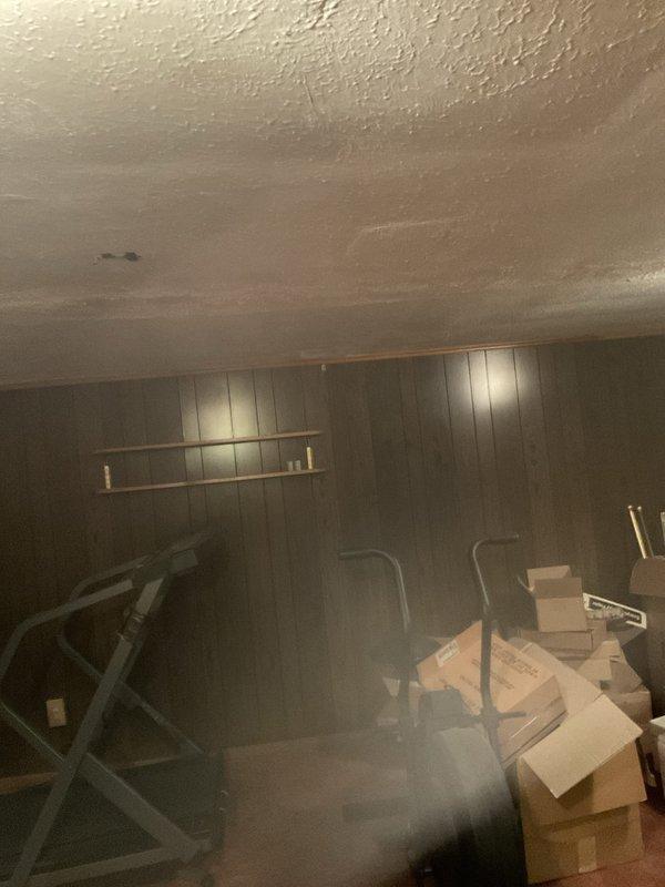 Installed new gas line in basement utility area to supply residential kitchen stove. Ran copper piping through exposed ceiling joists with proper fittings and connections, including shutoff valve for safety compliance. Line was routed from existing gas supply through unfinished basement space to kitchen appliance location, with all connections pressure-tested and verified for leak-free operation.