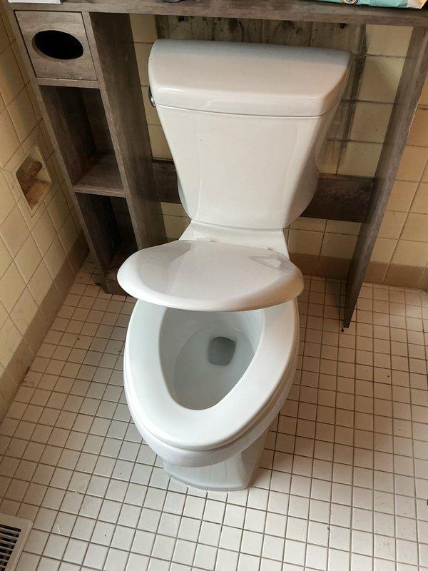 Responded to service call for toilet replacement in residential bathroom. Successfully removed and replaced two existing toilets with new fixtures. Addressed installation in bathroom with beige tile flooring and ensured proper sealing and mounting to prevent future water damage. Verified proper function of both units, including flush mechanisms and water supply connections. Completed installation with all fixtures secured and operational.