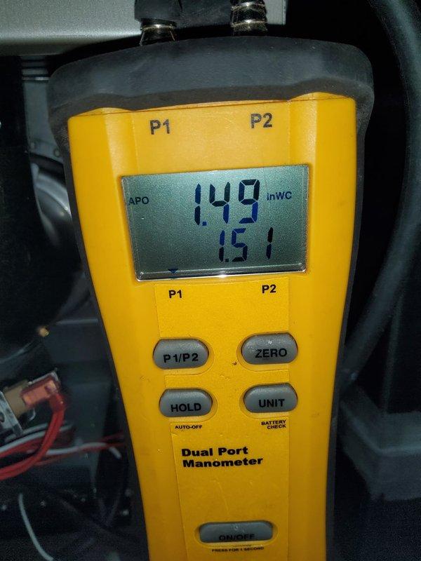 Completed full HVAC system installation including new furnace, evaporator coil, air conditioning unit, refrigerant line set, Ecobee thermostat, and ductwork modifications with new drop and elbow. Verified system pressures using dual port manometer, confirming proper static pressure readings of 0.149 inWC and 0.151 inWC. Updated electrical panel directory to reflect new HVAC equipment circuits for furnace and A/C unit.
