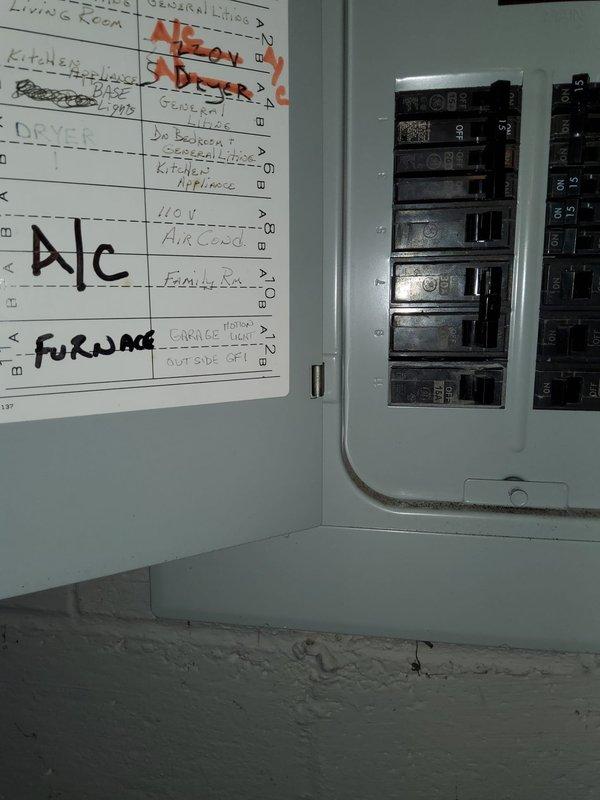 Completed full HVAC system installation including new furnace, evaporator coil, air conditioning unit, refrigerant line set, Ecobee thermostat, and ductwork modifications with new drop and elbow. Verified system pressures using dual port manometer, confirming proper static pressure readings of 0.149 inWC and 0.151 inWC. Updated electrical panel directory to reflect new HVAC equipment circuits for furnace and A/C unit.