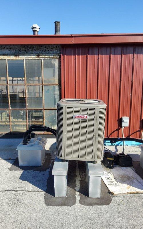 Responded to complaint of inadequate cooling on 4-year-old Lennox rooftop unit serving commercial warehouse facility. Upon arrival, performed diagnostic inspection of rooftop-mounted condenser unit. Verified unit operation, checked refrigerant lines, electrical disconnect, and condensate pump system. Unit found operating within normal parameters with no immediate mechanical failures detected. Provided customer with system status and recommendations for optimal performance.