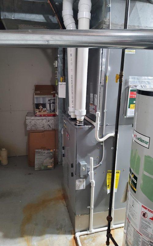Responded to service call for 4-year-old basement AC system not adequately cooling entire residence. Performed comprehensive system inspection of indoor furnace/air handler unit and outdoor condenser. Evaluated airflow, refrigerant levels, and electrical connections at both indoor and outdoor equipment. System found to be operating within normal parameters with no mechanical deficiencies identified. Reviewed thermostat settings and discussed proper system operation and airflow distribution considerations with homeowner to address cooling performance concerns.
