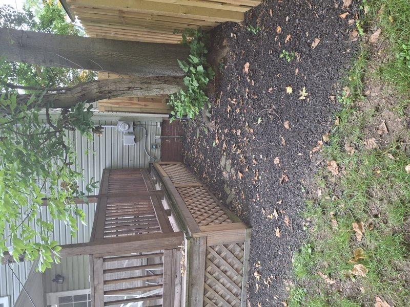 Conducted site evaluation for relocating outdoor condensing unit approximately 10 feet to new position in backyard. Assessed current installation location, electrical connections, refrigerant line routing requirements, and proposed relocation area near existing patio and pergola structure. Provided detailed estimate for unit relocation including line set extension, electrical modifications, and proper pad placement considerations.