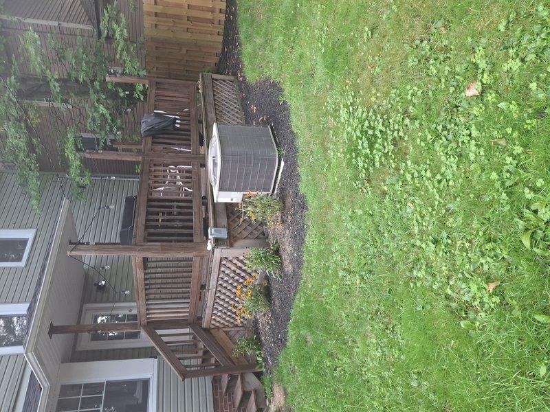 Conducted site evaluation for relocating outdoor condensing unit approximately 10 feet to new position in backyard. Assessed current installation location, electrical connections, refrigerant line routing requirements, and proposed relocation area near existing patio and pergola structure. Provided detailed estimate for unit relocation including line set extension, electrical modifications, and proper pad placement considerations.