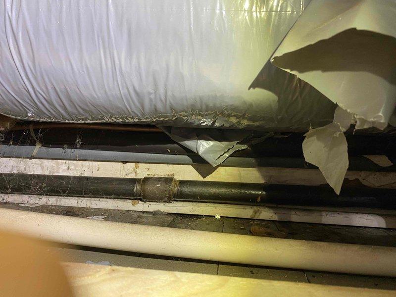 Responded to gas odor complaint for follow-up inspection after previous technician visit. Conducted thorough leak detection survey of accessible gas piping and connections throughout the property, including crawl space areas. Inspected gas lines, fittings, and joints using calibrated detection equipment. Documented existing conditions of mechanical systems and infrastructure in crawl space, noting damaged vapor barrier material and multiple utility penetrations. No active gas leaks detected during inspection. Verified proper operation of gas appliances and confirmed adequate ventilation in enclosed spaces.