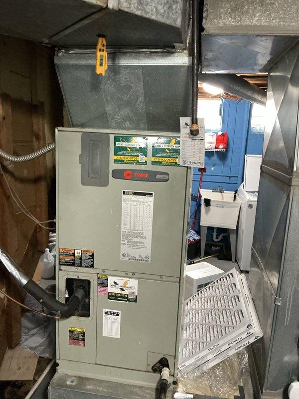 # HVAC Maintenance Service Completed

Performed preventive maintenance on a 2-year-old Trane air conditioning system. Conducted comprehensive system inspection including filter replacement, visual assessment of indoor furnace unit and outdoor condenser components, verification of proper operation, and documentation of equipment condition. All maintenance tasks completed per manufacturer specifications to ensure optimal system performance for the cooling season.