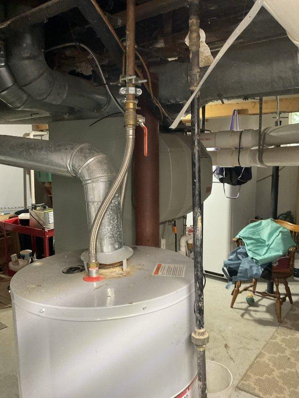 Responded to service call for leaking 40-gallon gas water heater requiring replacement. Upon inspection, confirmed existing AO Smith unit was actively leaking and beyond economical repair. Removed and disposed of failed water heater, installed new 40-gallon gas-fired water heater with proper venting and connections, verified all safety valves and pressure relief components functioning correctly, and tested unit for proper operation before completing service.