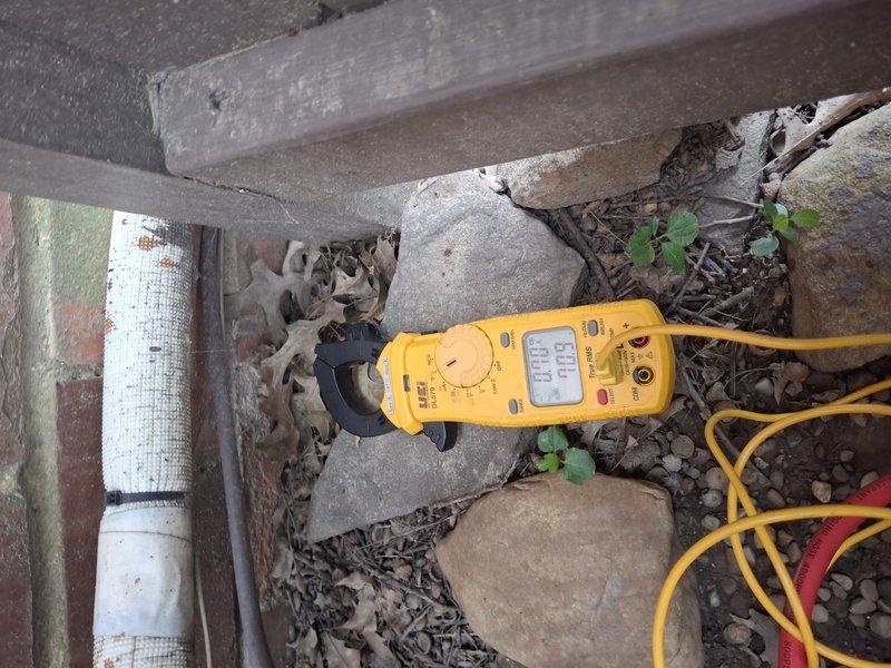 Responded to complaint of drilling noise coming from water pipes near air conditioning unit when system was operating. Upon arrival, confirmed noise ceased when AC was turned off. Performed diagnostic inspection of outdoor condensing unit and surrounding plumbing infrastructure. Measured electrical draw and operating temperatures to verify system performance. Determined noise was related to water hammer or pipe vibration induced by AC operation in 80-year-old home. Advised customer on potential causes and recommended follow-up with plumbing specialist to address pipe securing and water pressure regulation to prevent future occurrences and mitigate pipe burst risk.