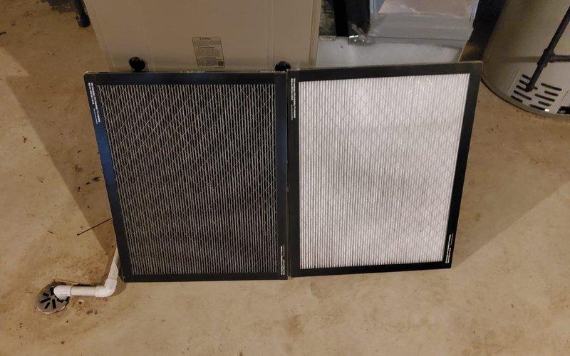 Completed scheduled cooling system tune-up on 6-year-old HVAC unit. Performed comprehensive maintenance inspection, replaced heavily soiled air filters with new units as evidenced by significant dust and debris accumulation on original filters, and verified system operational parameters meet manufacturer specifications.