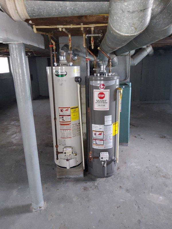 Conducted on-site assessment for tanked water heater replacement in residential basement utility area. Inspected existing dual water heater installation, including an A.O. Smith unit and secondary tank, evaluating current plumbing connections, copper piping infrastructure, valve configurations, and overall system condition. Documented equipment specifications, manufacturer information, and existing installation parameters. Photographed water heater placement, pipe routing, HVAC ductwork clearances, and available workspace for future replacement work. Provided detailed estimate for new tanked water heater installation including removal of existing unit, proper disposal, and installation of replacement equipment with code-compliant connections.