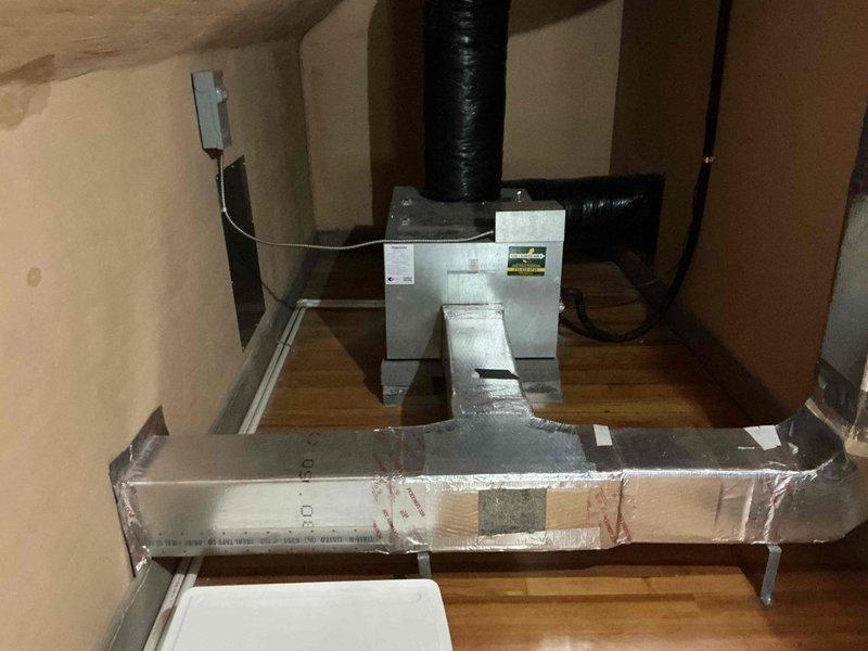Completed on-site assessment for steam boiler replacement estimate to replace existing Mouat boiler system. Documented current mechanical room configuration including existing blue boiler unit with associated piping, valves, and connections, as well as attic-level HVAC equipment for potential Unico AC unit installation. Provided comprehensive estimate for new steam boiler installation and separate pricing for new Unico air conditioning system.