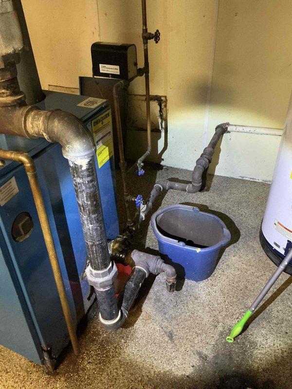 Completed on-site assessment for steam boiler replacement estimate to replace existing Mouat boiler system. Documented current mechanical room configuration including existing blue boiler unit with associated piping, valves, and connections, as well as attic-level HVAC equipment for potential Unico AC unit installation. Provided comprehensive estimate for new steam boiler installation and separate pricing for new Unico air conditioning system.