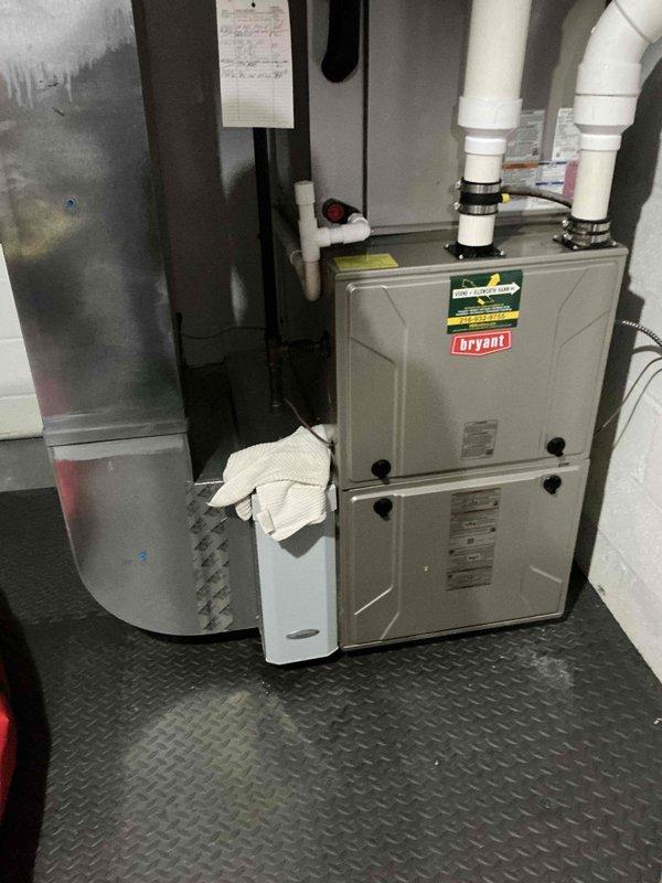 Conducted on-site evaluation for complete HVAC system replacement at residential property. Assessed existing Bryant furnace installation, electrical service panel capacity, and current infrastructure including venting, condensate drainage, and ductwork connections to provide comprehensive replacement estimate and equipment recommendations.
