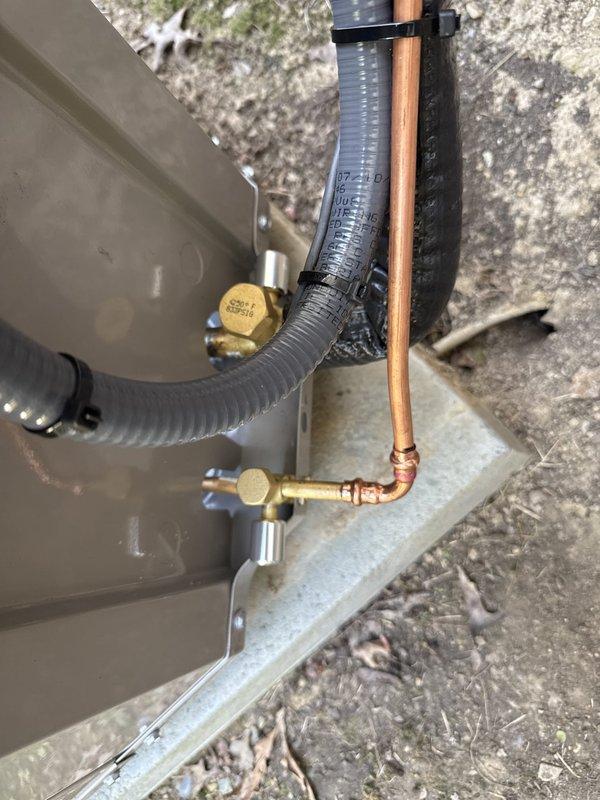 Completed full HVAC system replacement including furnace, evaporator coil, air conditioning condenser unit, and thermostat. Removed existing equipment and installed new Bryant outdoor condensing unit on concrete pad against exterior foundation. Connected refrigerant lines with proper copper piping and brass fittings, installed shutoff valve for service access, and routed electrical conduit along exterior siding to power supply. Installed new evaporator coil matched to system specifications and connected all refrigerant lines with insulated suction line. Replaced furnace unit and integrated new programmable thermostat for complete system control. Verified all electrical connections, tested refrigerant pressures, and confirmed proper airflow throughout system. System operational and performing to manufacturer specifications.