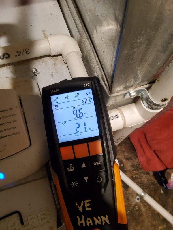 Completed comprehensive AC and furnace maintenance with focus on indoor air quality concerns related to musty odor reported throughout the home. Performed combustion analysis on 15-year-old furnace using Testo 310 analyzer, recording oxygen levels at 9.6% and carbon monoxide at 21 ppm, which fall within acceptable parameters. Inspected Rheem HVAC system (Model: CNPVP3617ALAAAAA) containing R-410A refrigerant and assessed all accessible components for potential odor sources. Replaced air filter in Aprilaire air cleaner as requested. Evaluated ductwork, condensate drain lines, and evaporator coil area for microbial growth or moisture accumulation that could contribute to musty smell. Verified proper airflow and system operation on both heating and cooling equipment.