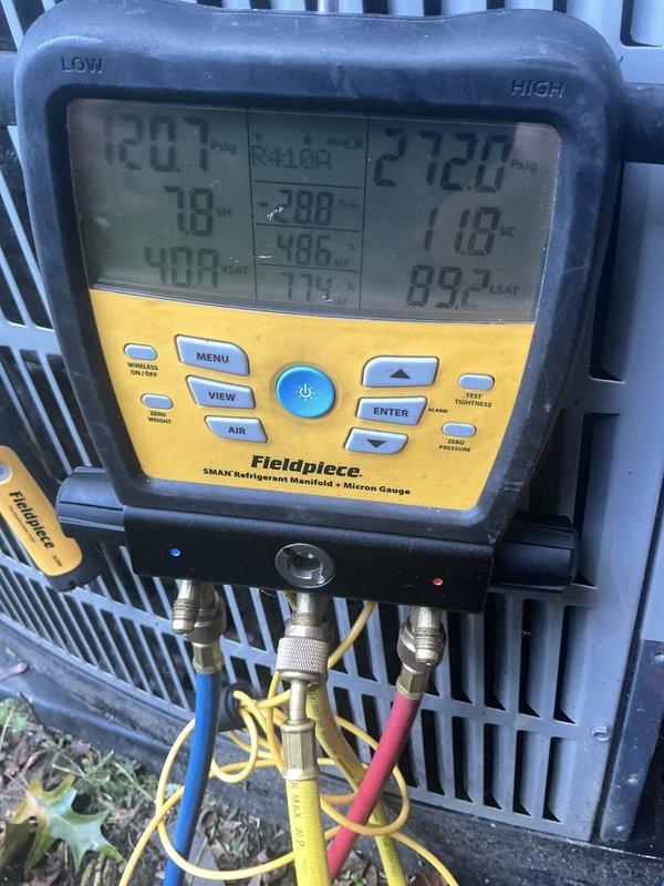 Responded to no cooling complaint on attic-mounted air conditioning system of unknown age. Upon arrival, performed comprehensive system diagnostics using refrigerant manifold gauges to measure operating pressures and temperatures on both high and low side of the system. Accessed attic unit through existing access point, navigating around ductwork and insulation to reach equipment. Connected diagnostic equipment to service ports and evaluated system performance, including superheat and subcooling calculations to determine refrigerant charge status and overall system operation. Measurements indicated system pressures and temperatures, allowing for proper assessment of compressor function, refrigerant flow, and heat exchange efficiency. Completed thorough evaluation of the condensing unit and verified proper electrical connections and component operation to restore cooling capacity.