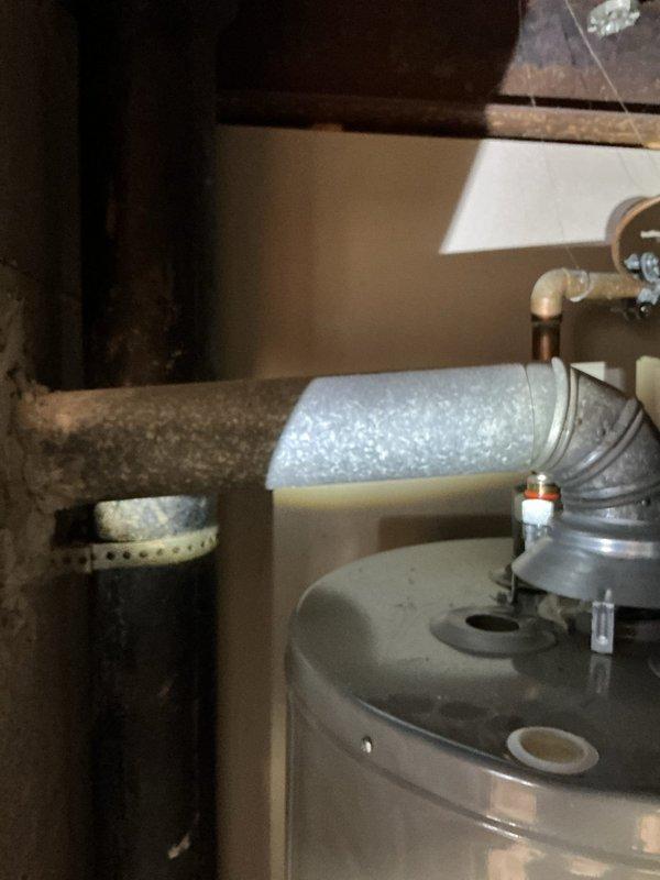 Responded to reported hot water tank leak and conducted diagnostic assessment. Upon inspection, identified frost buildup on copper supply line indicating temperature differential issue rather than active leak from tank itself. Monitored system through heating cycle to verify leak source and inspected all connections, fittings, and pressure relief valve. Installed pressure gauge on system to verify proper operating pressure and rule out pressure-related concerns. 

Performed complimentary whole-home plumbing assessment as requested, including inspection of all visible supply and drain lines, fixtures, and connections throughout property. Investigated upstairs shower plumbing to address reported knocking in pipes, identifying potential water hammer condition requiring further evaluation of air chambers or possible installation of water hammer arrestors. Documented all findings with photographic evidence showing frosted copper piping and pressure monitoring equipment installation. Secured