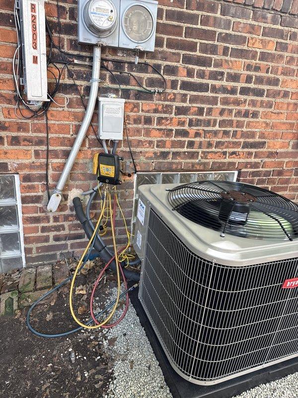 Completed full HVAC system replacement including new outdoor condensing unit (Model CYAVA5N7MA48BA) and evaporator coil with R-454B refrigerant. Relocated and secured return air ductwork to properly integrate with new equipment. System tested and verified operational with diagnostic gauges confirming proper refrigerant pressures and electrical connections secured at exterior disconnect.