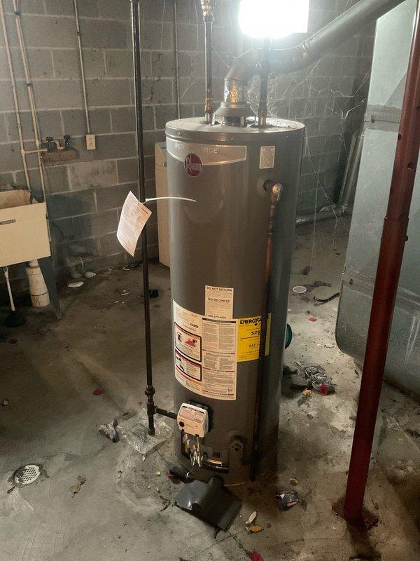 Responded to no hot water complaint on Rheem tanked water heater. Upon inspection, identified faulty shut-off valves preventing proper water flow to the unit. Recommended valve replacement to restore hot water functionality.