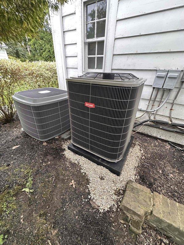 Completed installation of a Unico high velocity air conditioning system serving the second and third floors with a 2.5-ton capacity unit. Installed new smart high-efficiency blower module, coated evaporator coil module for extended service life, outdoor condenser unit on new pad, outdoor electrical disconnect box, drain pan with safety switch, and digital programmable thermostat. Utilized existing ductwork with no modifications to supply vents required, ensuring efficient integration with the home's current HVAC infrastructure.