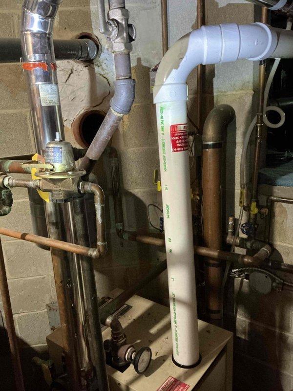 Performed estimate for replacement of 25-year-old residential water boiler system. Assessed existing copper piping network, control components, and current boiler configuration showing significant age-related wear including oxidation and mineral deposits. Customer requesting Weil-McClain replacement unit with installation scheduled for follow-up confirmation.