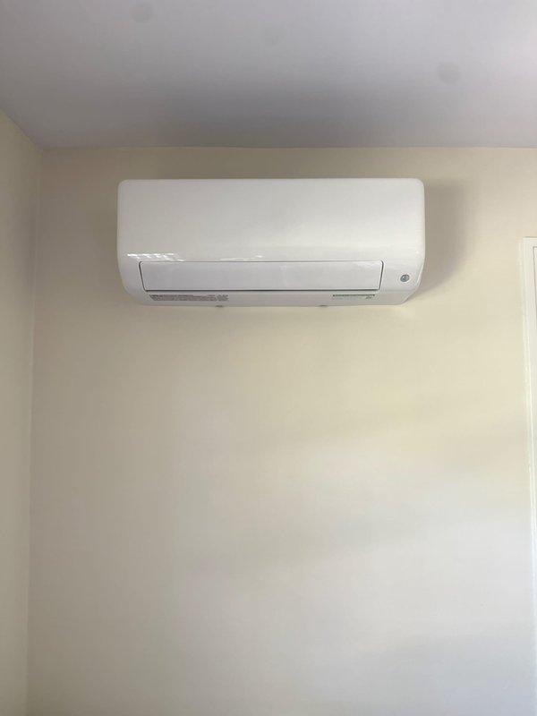 Completed installation of a new 5-zone Bryant ductless mini-split heat pump system. Mounted three 9K BTU high wall units in bedrooms, one 12K BTU high wall unit in dining room, and one 12K BTU floor console unit in living room. Routed refrigerant lines and electrical connections through basement to outdoor condenser unit positioned at rear of home. All indoor units mounted per specifications with clean line sets concealed where possible. System tested, commissioned, and verified operational across all zones.