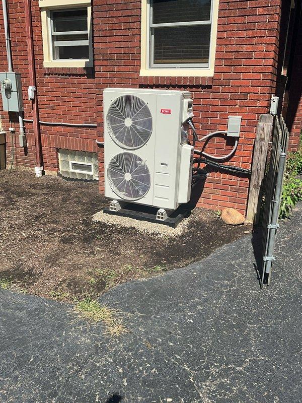 Completed installation of a new 5-zone Bryant ductless mini-split heat pump system. Mounted three 9K BTU high wall units in bedrooms, one 12K BTU high wall unit in dining room, and one 12K BTU floor console unit in living room. Routed refrigerant lines and electrical connections through basement to outdoor condenser unit positioned at rear of home. All indoor units mounted per specifications with clean line sets concealed where possible. System tested, commissioned, and verified operational across all zones.