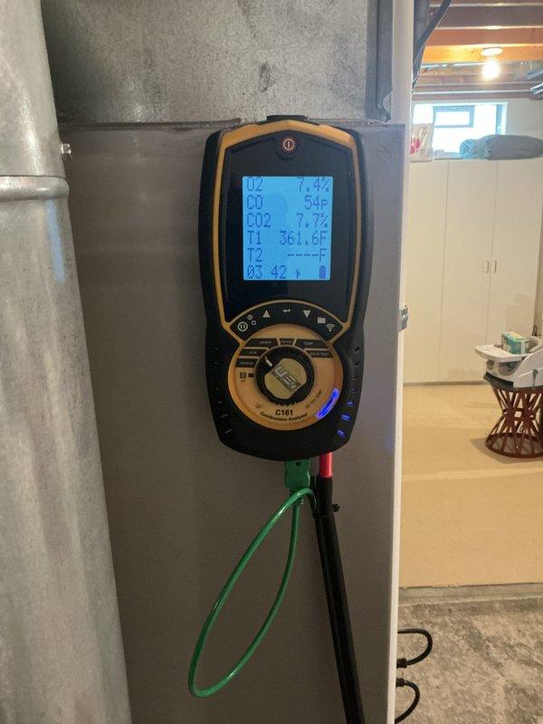 Completed annual furnace maintenance and tune-up on a 5-year-old heating system located in basement. Performed comprehensive system inspection with no issues reported by homeowner. Conducted combustion analysis testing using digital analyzer, measuring CO levels, CO2 percentages, and temperature differentials across the system. All readings confirmed normal operating parameters. System operating efficiently with proper airflow through ductwork. Unit maintained preventatively as part of ongoing membership maintenance program, valid through 2026.