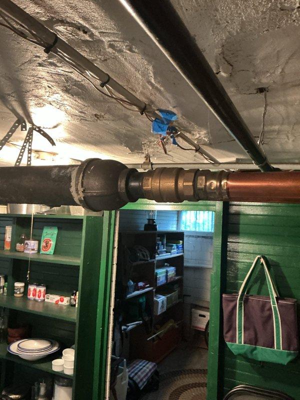 Completed comprehensive maintenance service on a commercial-sized 250,000 BTU hot water boiler system. Performed full system inspection including visual assessment of all major components, burner assembly, heat exchanger, and associated piping infrastructure. Inspected copper supply and return lines with brass fittings for proper connections and potential leaks. Evaluated thermostat operation and noted display showing improper reading requiring attention. Checked all safety controls, pressure relief valve, and system pressure levels. Cleaned and tested burner components, verified proper combustion, and adjusted as necessary for optimal efficiency. Inspected venting system for proper draft and clearances. Lubricated circulator pump and verified proper operation. Tested all electrical connections and control circuits. System operational upon completion with recommendation for service contract renewal.